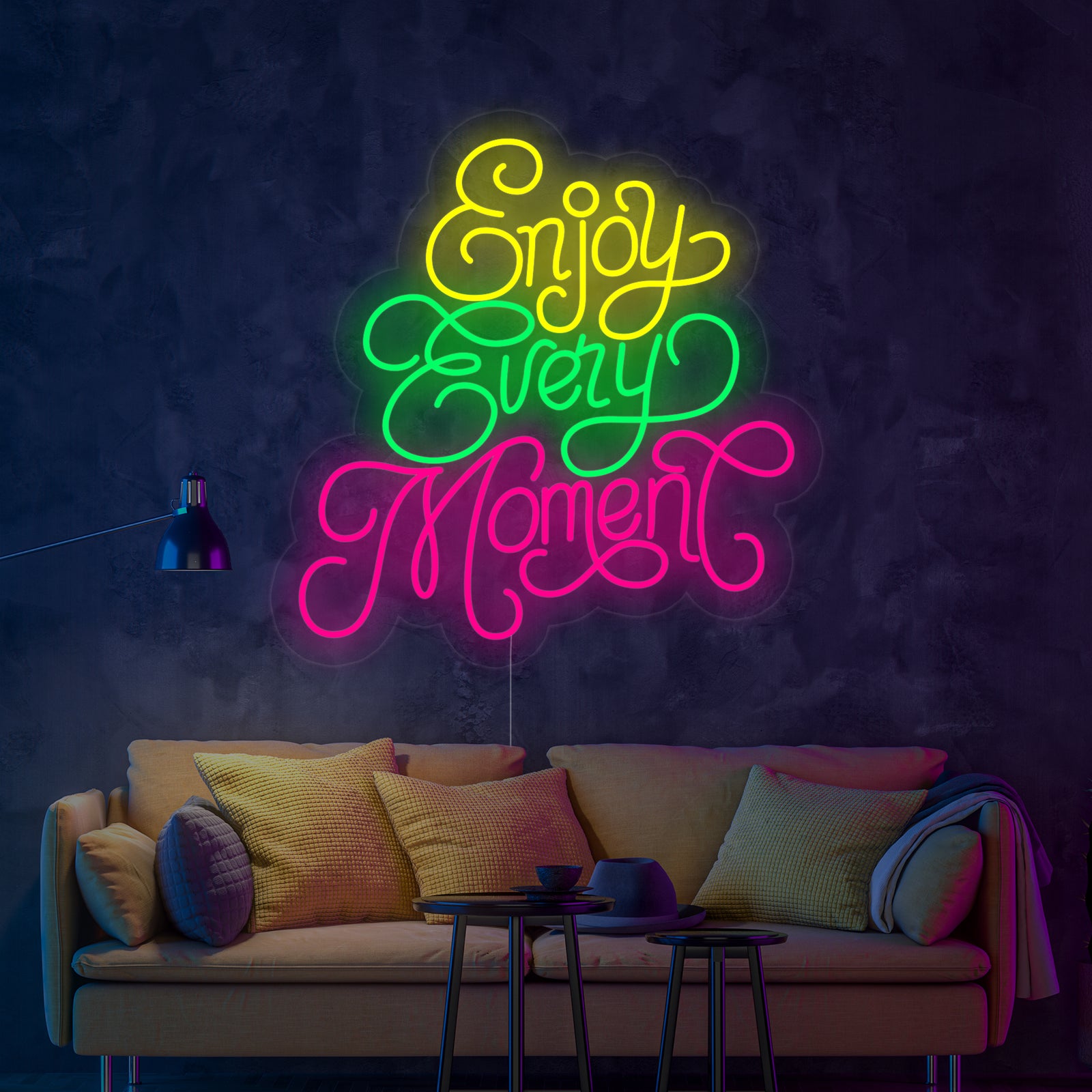 A clear, straight-on view of the 'Enjoy Every Moment' script neon sign glowing in white light, mounted on an invisible clear acrylic backing, showcasing the elegant handwriting font and power cord detail.