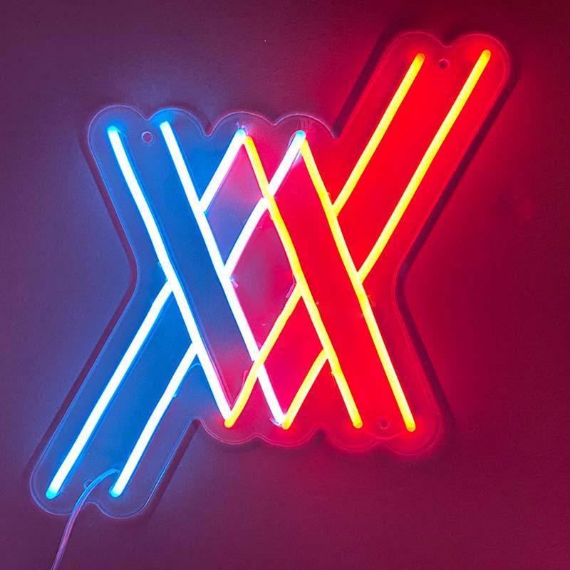 FRANXX Neon Sign glowing on a wall.