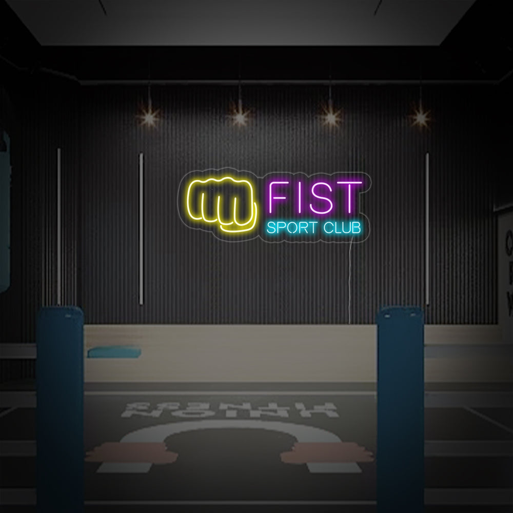 Close-up of the 'Fighting Fist Sport Club' neon sign showing the physical tubing structure and construction.