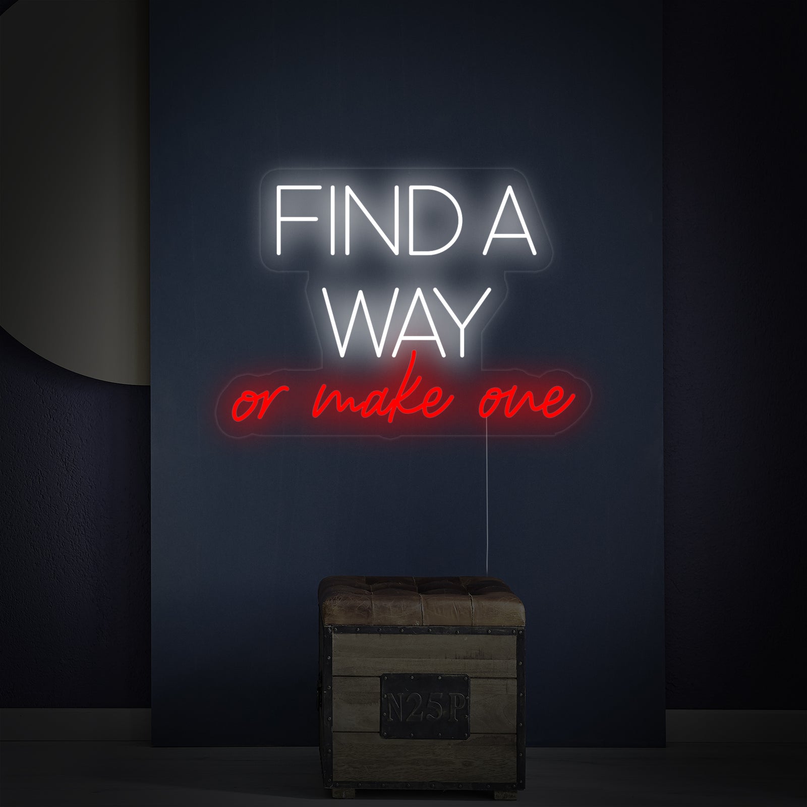 A close-up view of the 'Find A Way Or Make One' neon sign glowing, revealing the transparent acrylic backing and neat installation on a smooth wall.