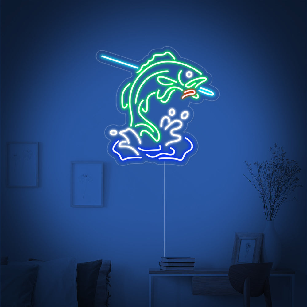Detailed product visualization of the 'Fish Logo' neon sign mounted against a plain dark wall, showcasing the acrylic backing and wire connection.