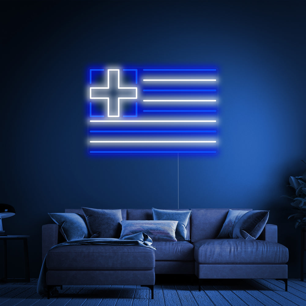 Flag of Greece neon sign with visible tubing and clear backing mounted on a modern blue wall in a stylized living room