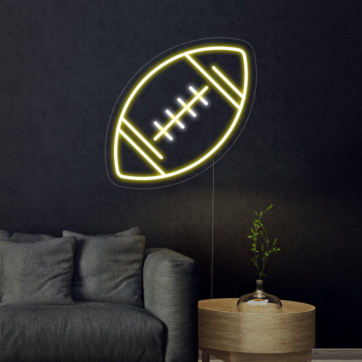 A glowing Football Ball neon sign on a neutral background.
