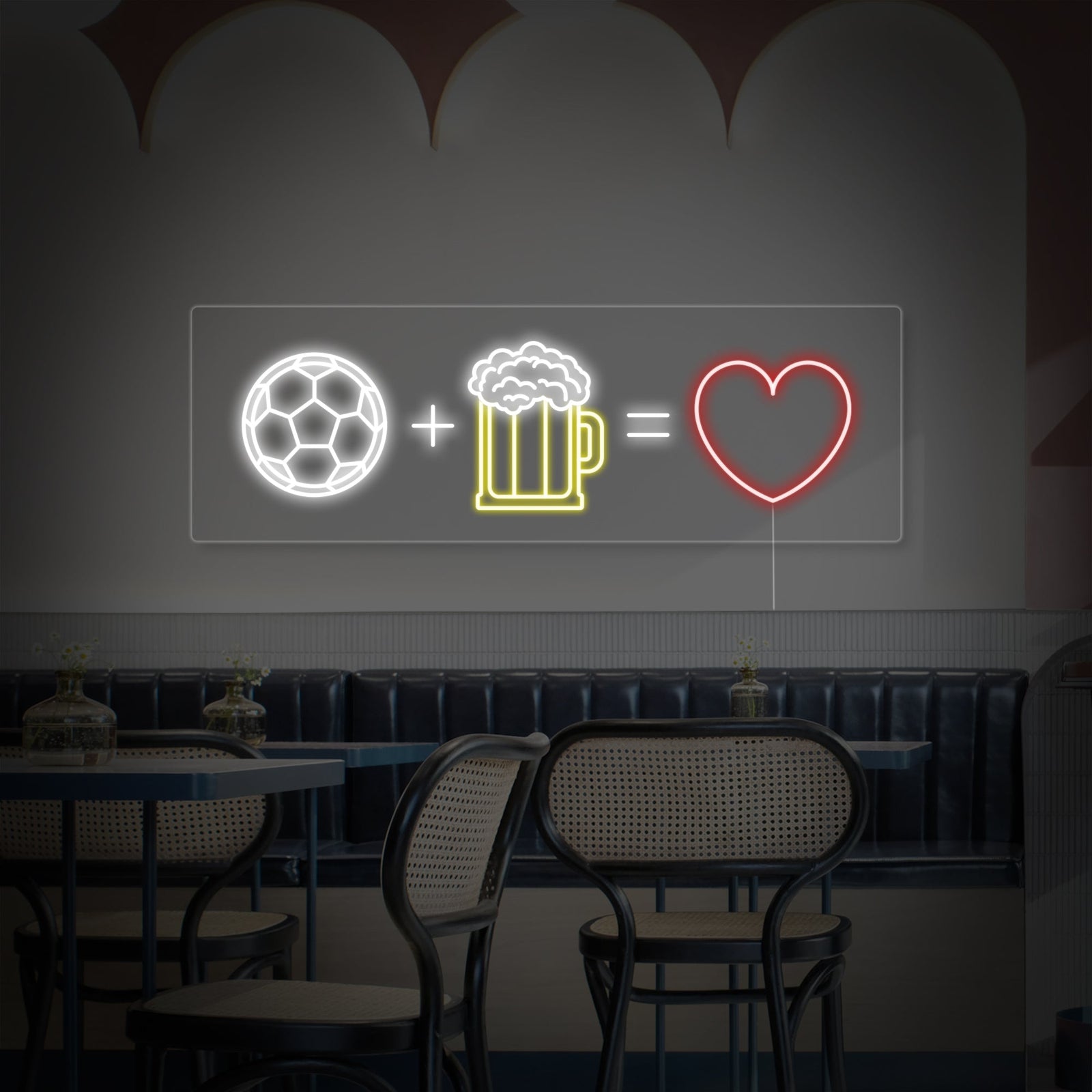 Close-up view of the "Football Beer Love" neon sign showing the design and physical details like the hanging hardware.