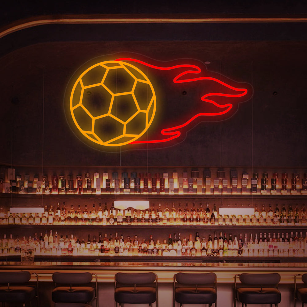A glowing 'Football with Flame' neon sign as the centerpiece above a home bar in a dimly lit room, creating an inviting atmosphere.