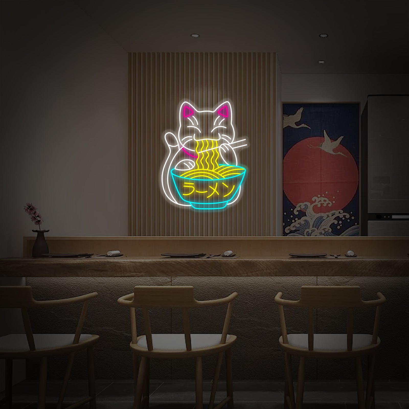 The Fortune Cat Ramen neon sign is mounted on a textured brick wall within a dimly lit, bustling Japanese noodle shop, adding a vibrant glow to the decor.