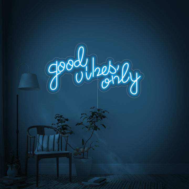 Flat view showing the Good Vibes Only neon sign design, illuminating with light on a clean acrylic backing with a black power cord visible.
