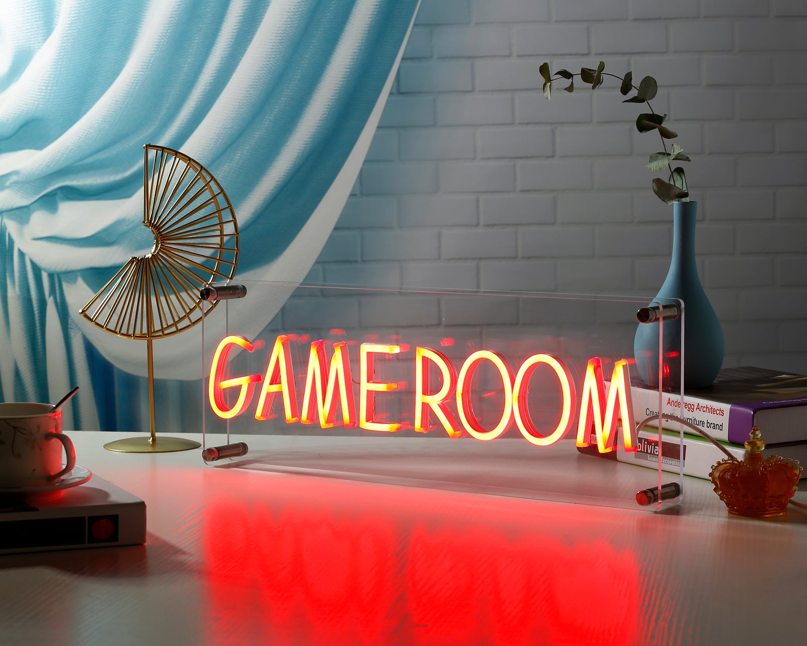 Vibrant "Game Room" desk neon sign with green and orange glow on clear acrylic stand.