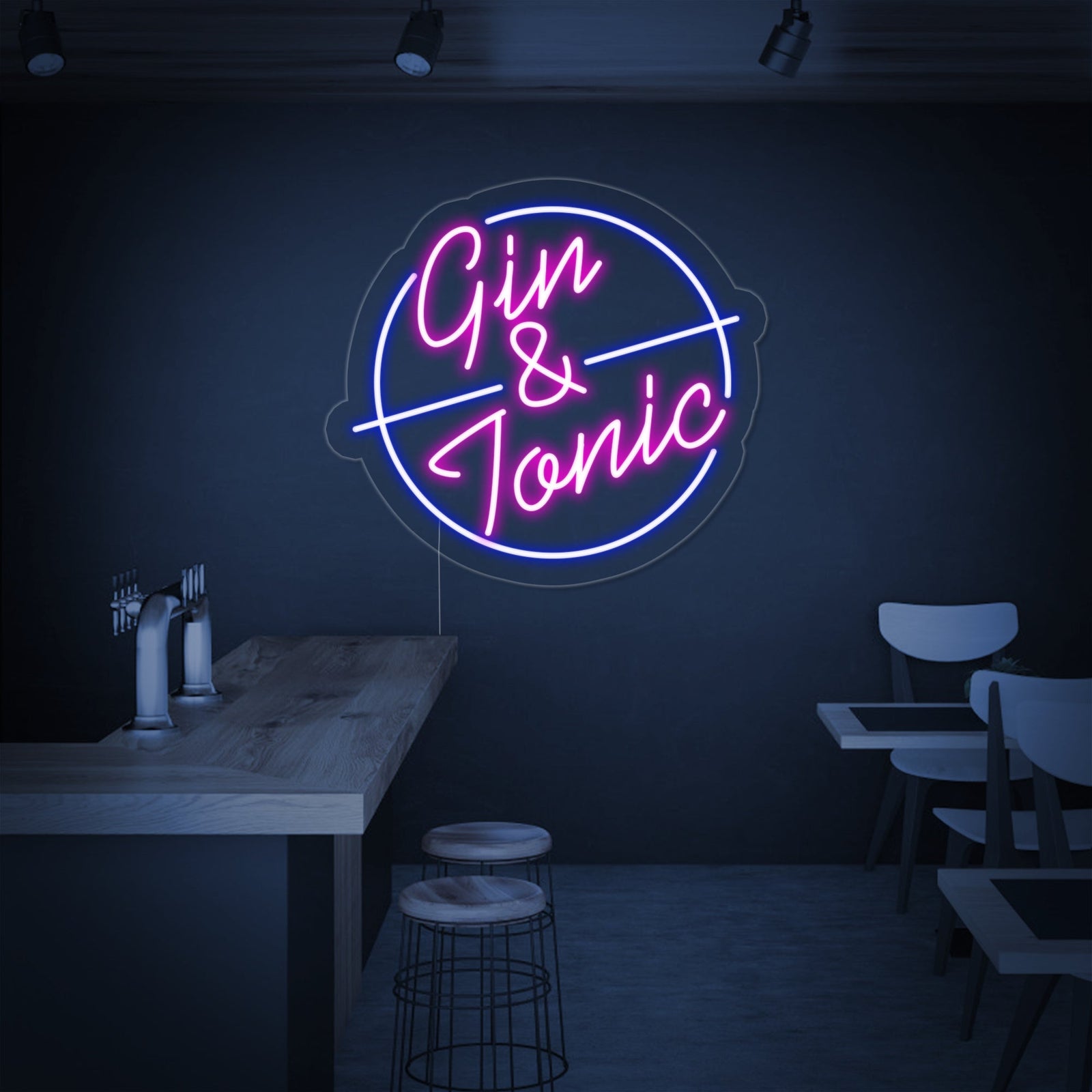 A glowing 'Gin and Tonic' neon sign in green script with stylized glass and lime icons, displayed above a wooden bar counter with cocktail ingredients.