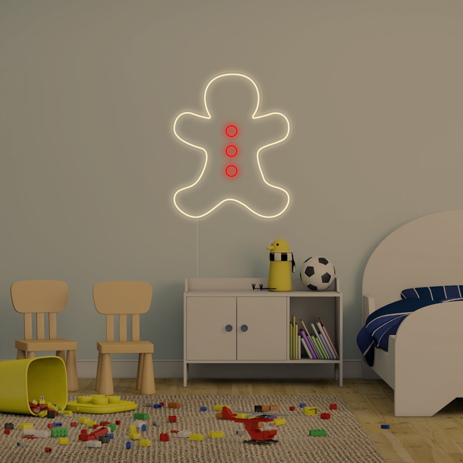 A glowing neon wall sign shaped like a friendly Gingerbread Man, displaying a warm white and slightly orange light. The simple, cheerful design is centered on a light-colored, slightly textured wall, serving as a bright focal point.