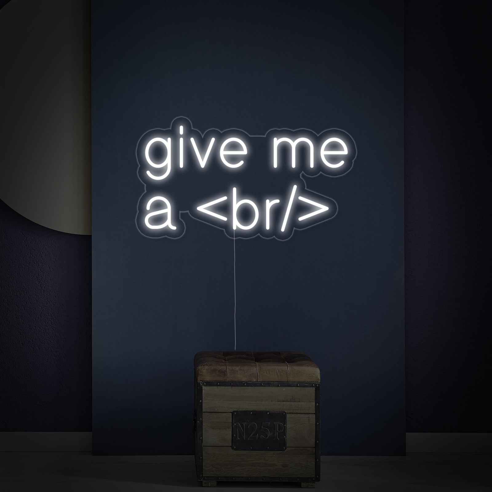 The complete 'Give Me A Break For Geeks' neon sign design, showing the lettering and the acrylic backing, set against a blurred indoor environment.