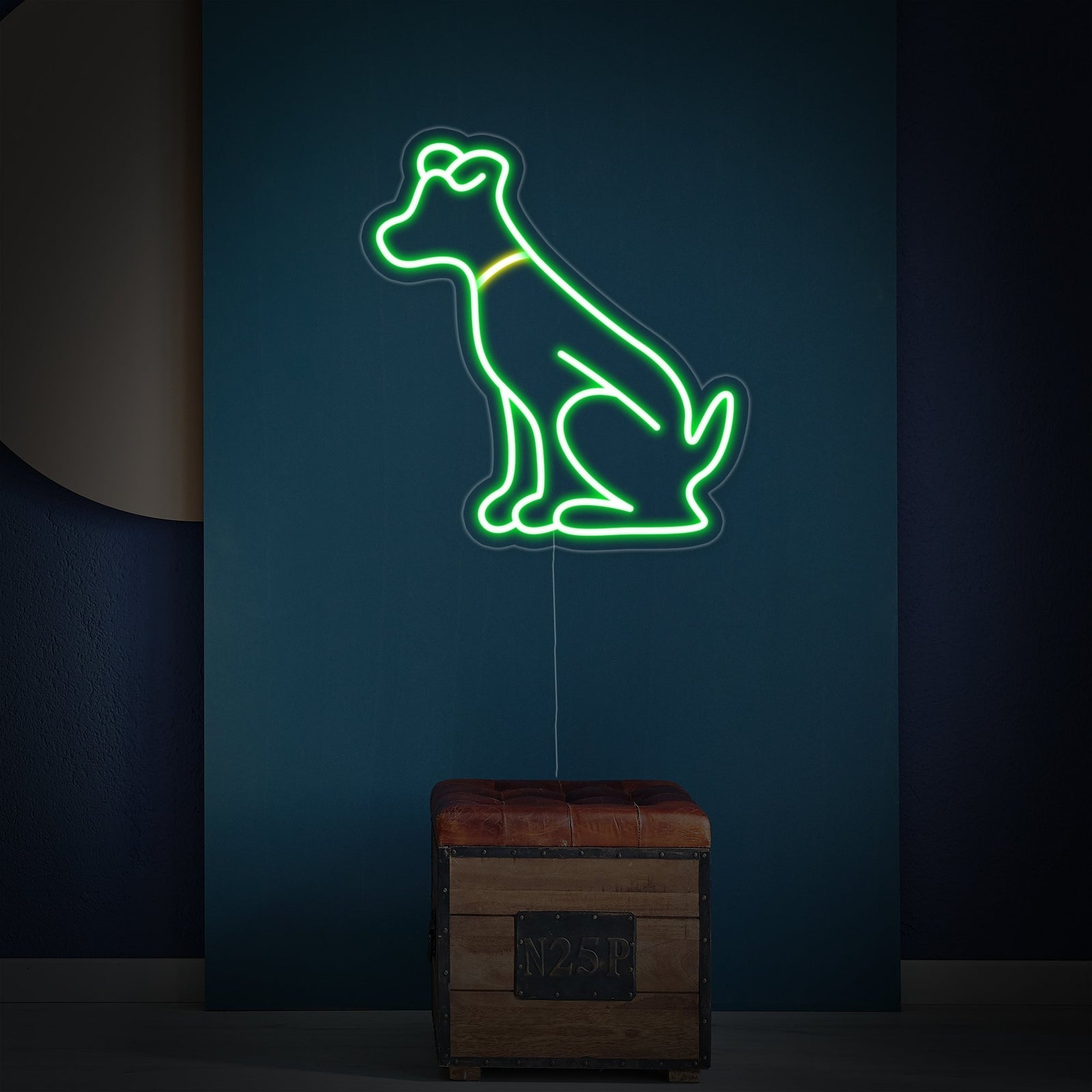 A detailed product shot of the controller-shaped 'Green Dog' neon sign, showing the glow against a clear acrylic backing.
