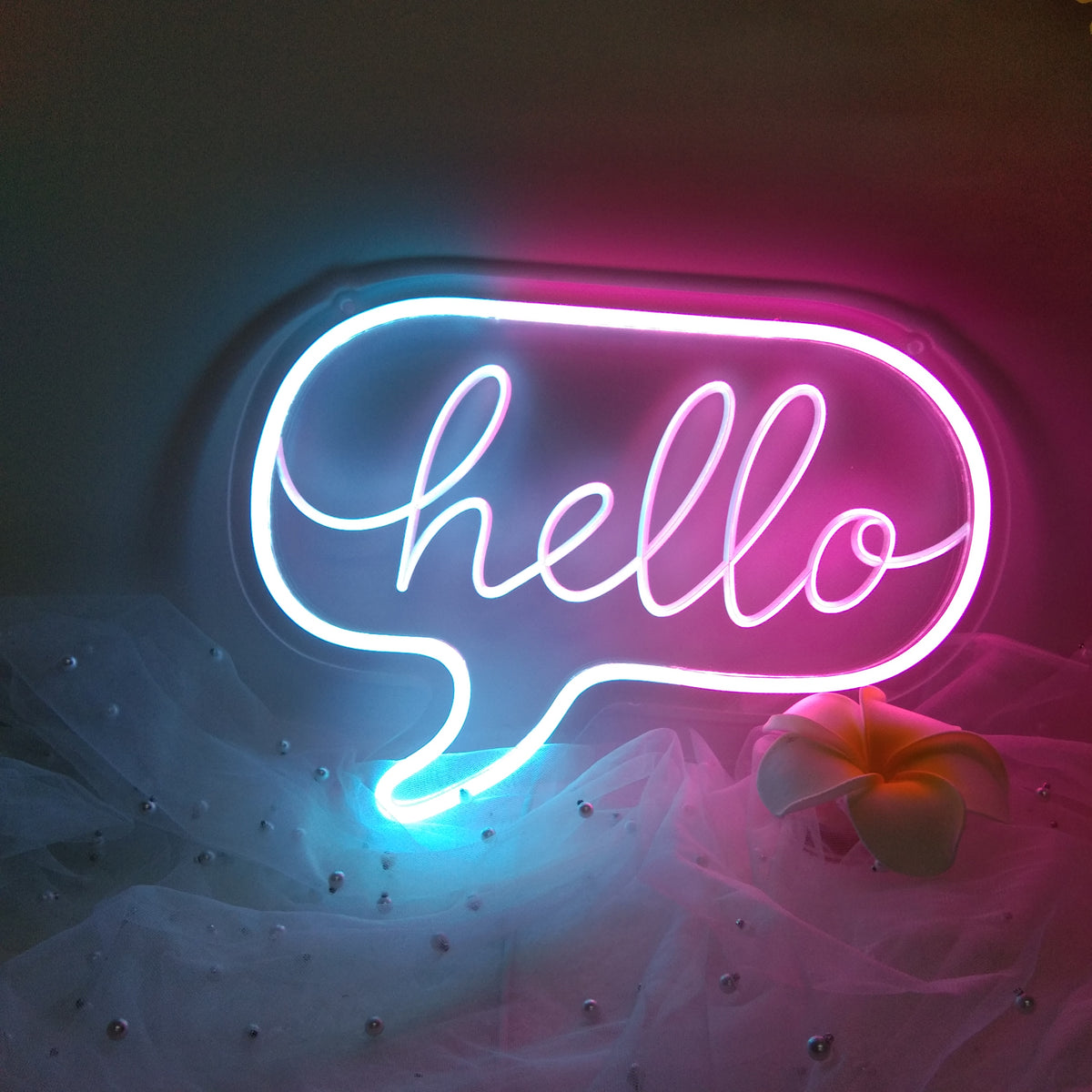 Close-up view of the glowing "Hello" neon sign and clear acrylic backing.