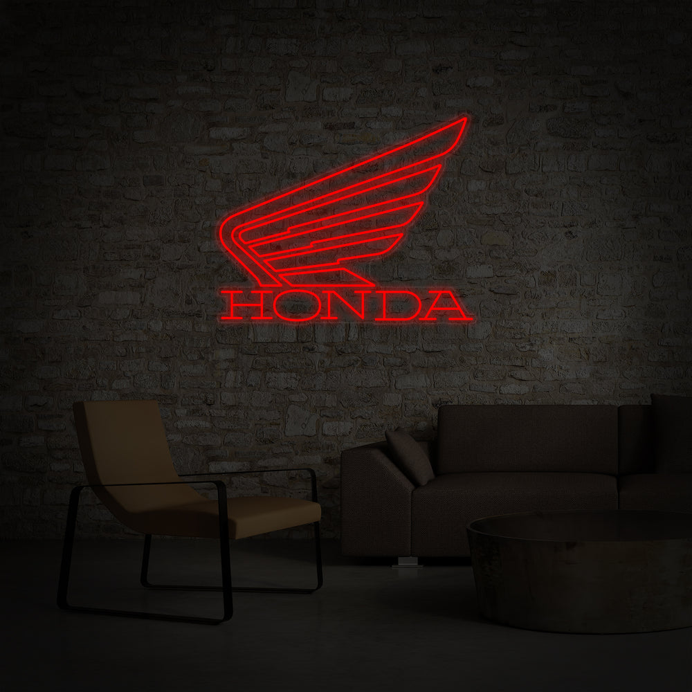 A flat design rendering of the white Honda logo and red lettering transformed into a neon sign style against a brick background.
