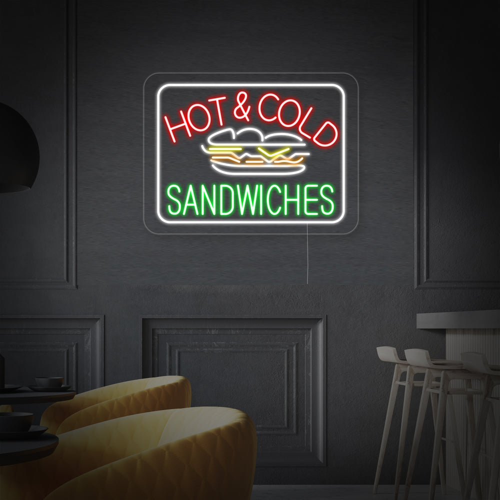 Close-up of the unlit 'Hot Cold Sandwiches' neon sign showing the white tubing and backing structure against a white background.
