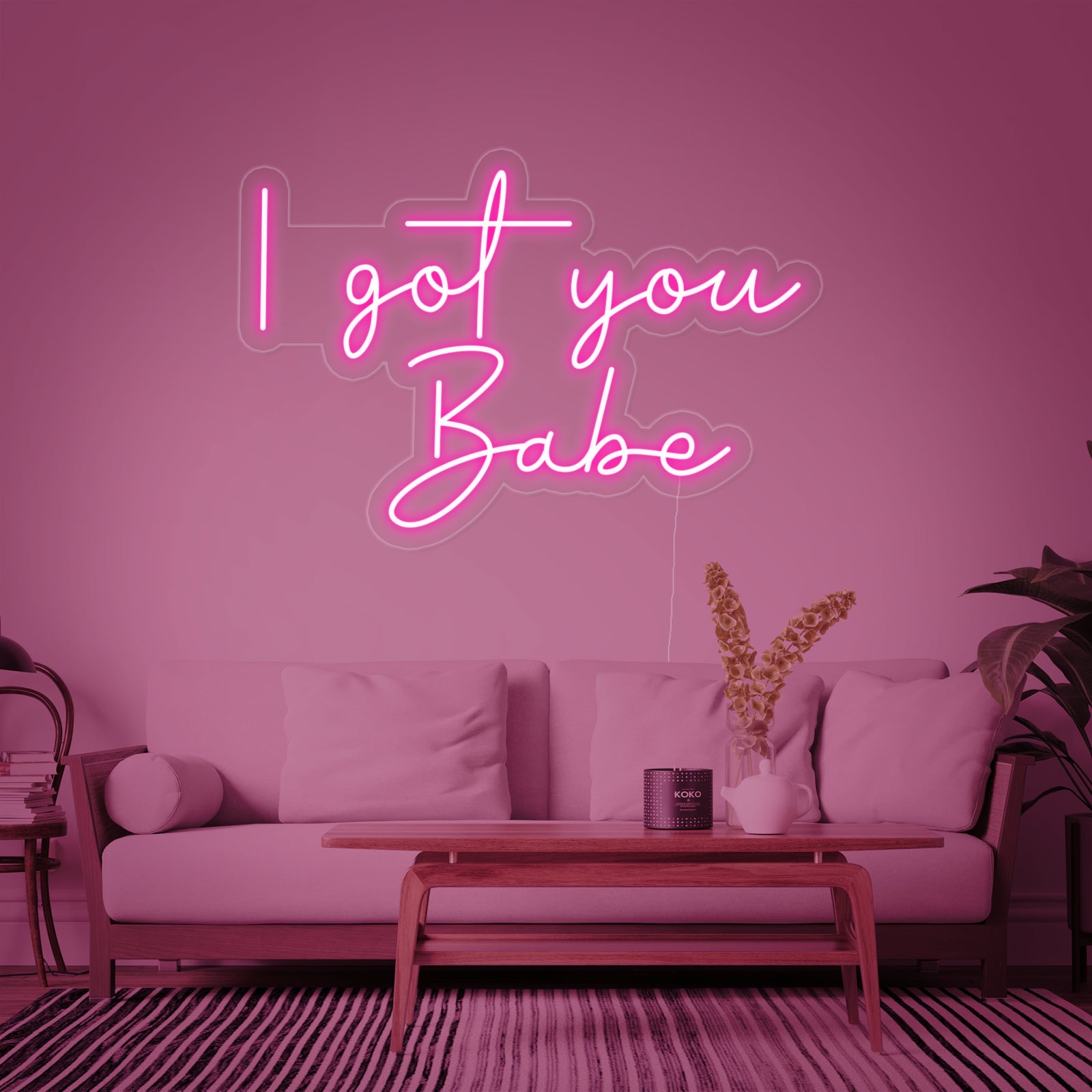Close up of I Got You Babe glowing neon sign