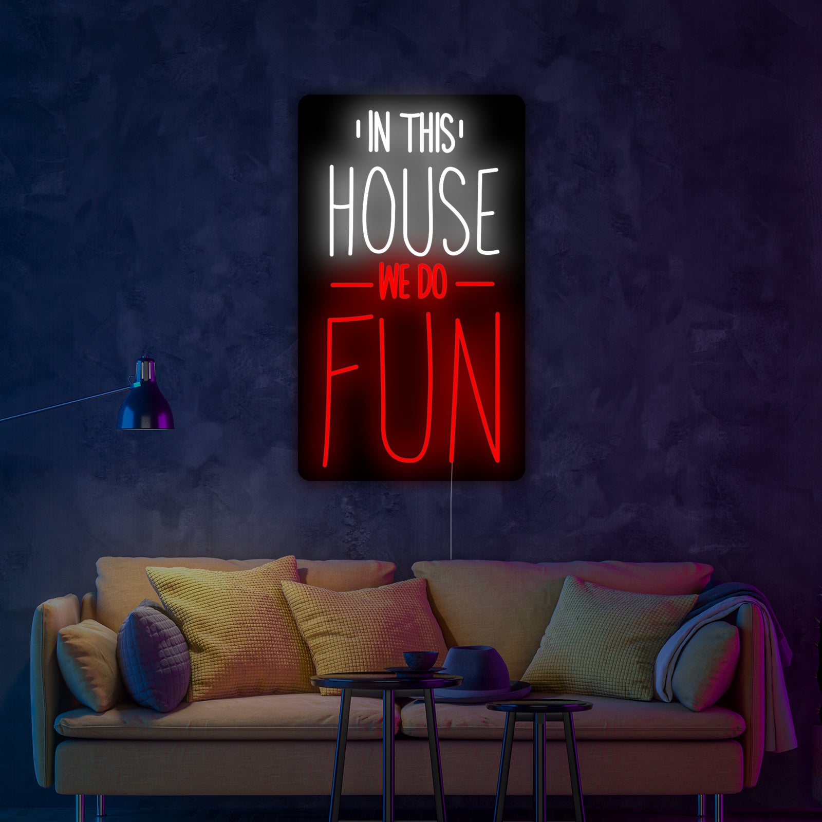 Detail view of the 'In This House We Do Fun' neon sign showcasing its design and illuminated tubing.