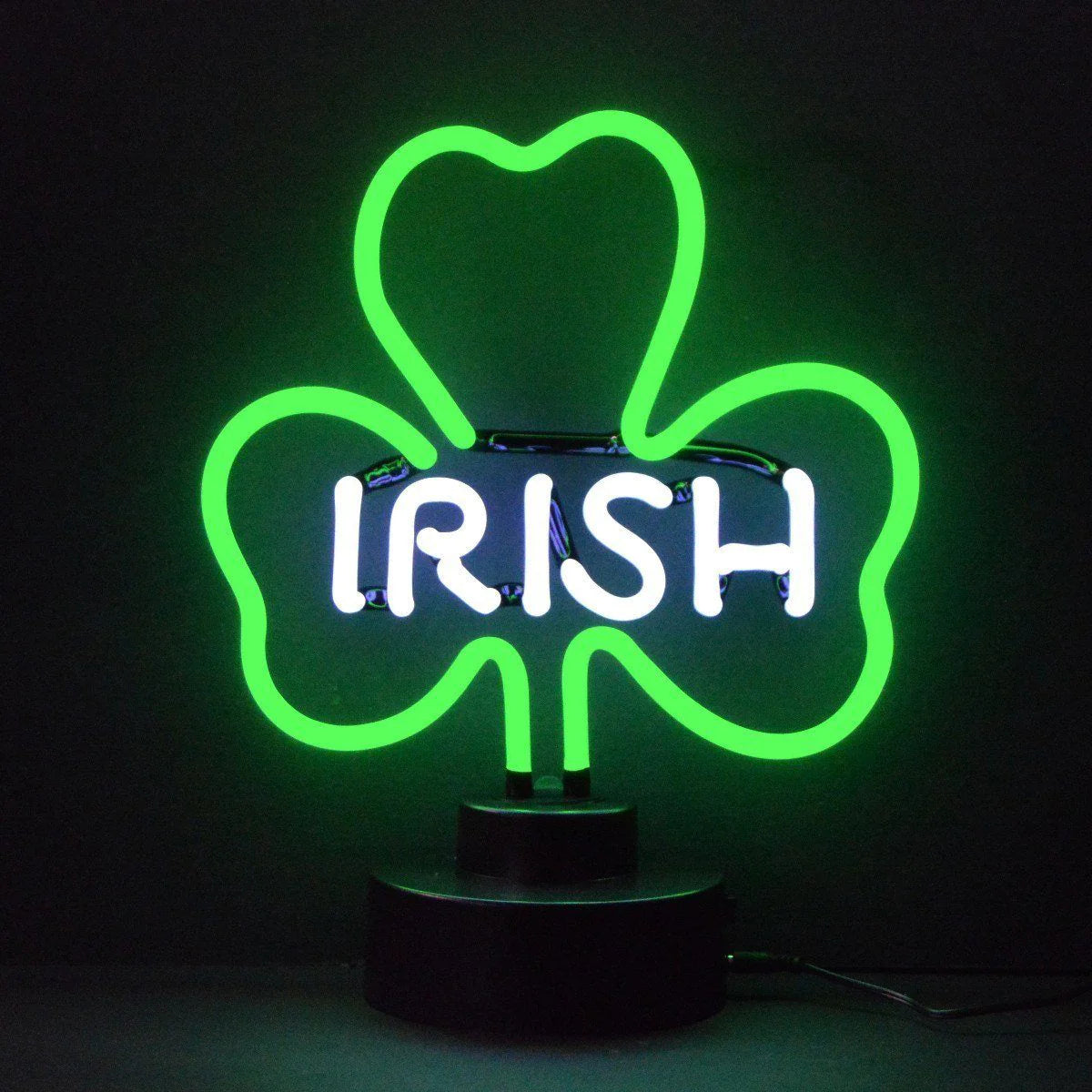 Vibrant green Irish Shamrock table neon sign glowing brightly with visible glass tube details and physical wire connections on a real plastic base.