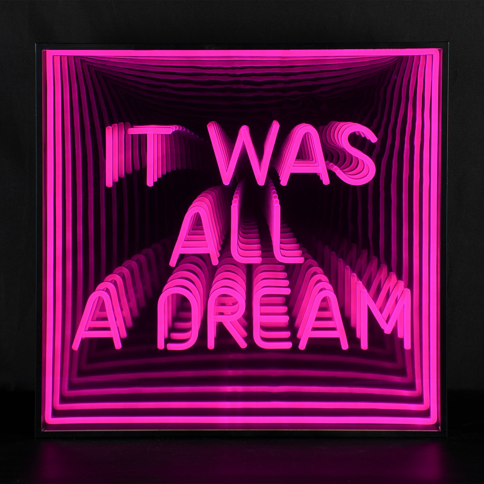 A photorealistic view of the glowing pink It Was All A Dream infinity mirror neon sign mounted in a dark room.