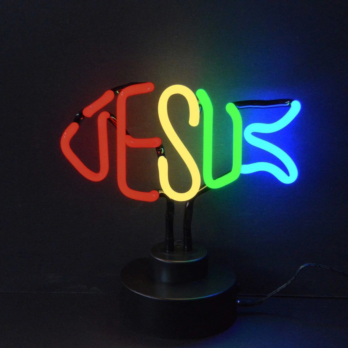 Handcrafted glass 'Jesus Fish' table neon sign glowing red on a wooden table base.