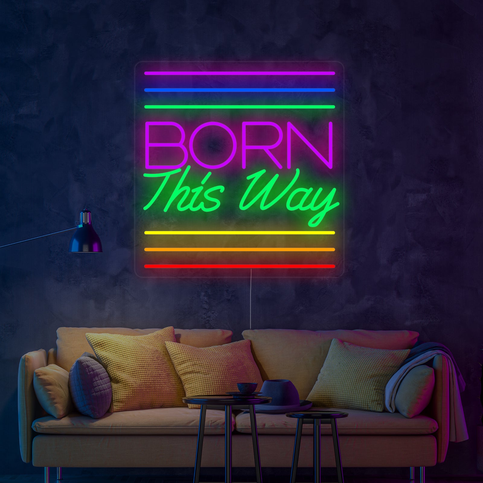 Close-up of the "Born This Way" rainbow neon sign showing tubing details and transparent acrylic backing