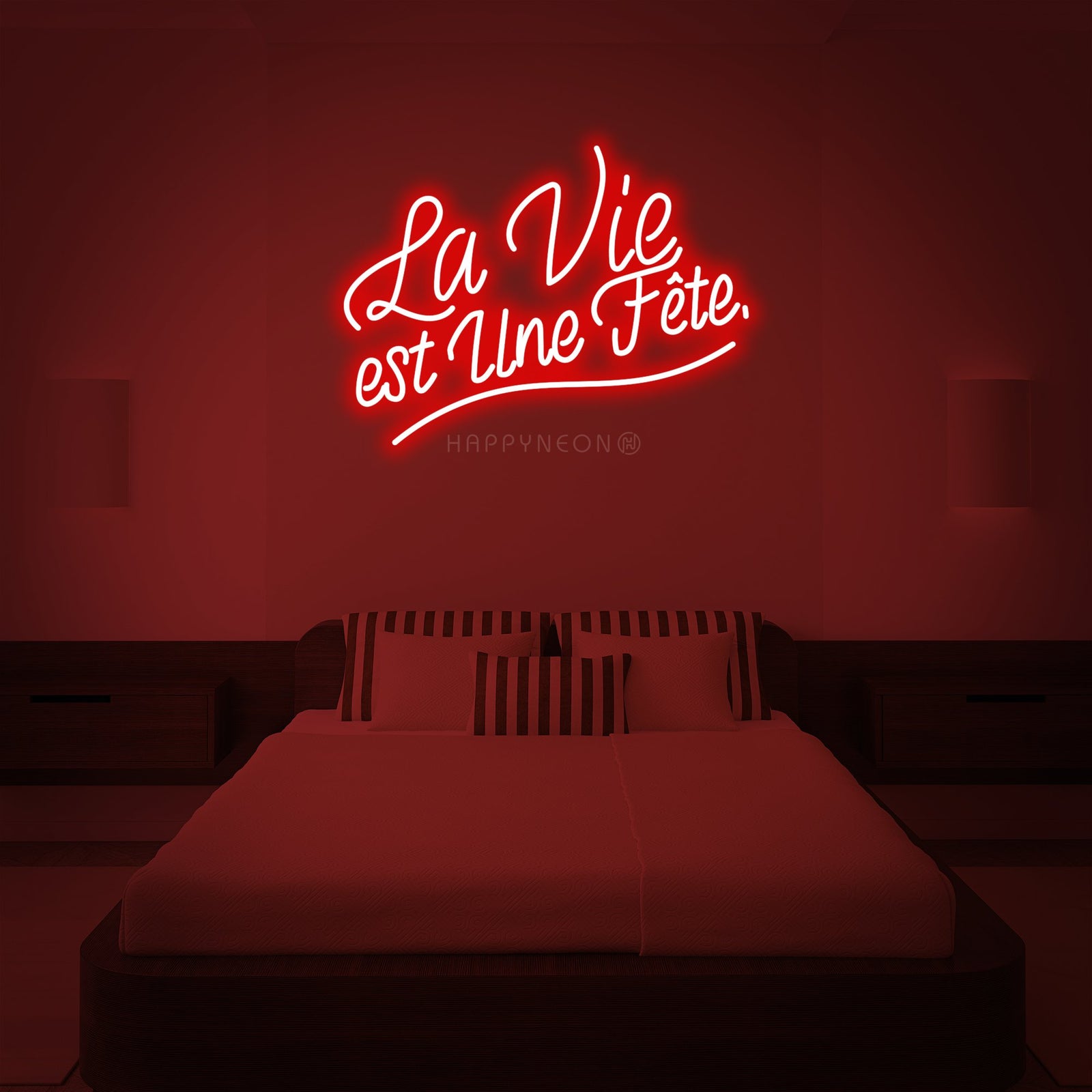Clean vector mockup of the 'La Vie est Une Fete' neon sign design against a solid red wall backdrop