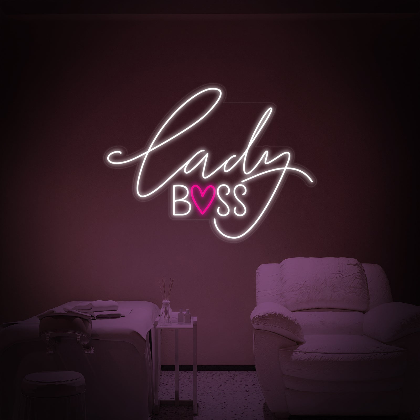 The glowing Lady Boss neon sign creates a motivational atmosphere in a beauty studio.