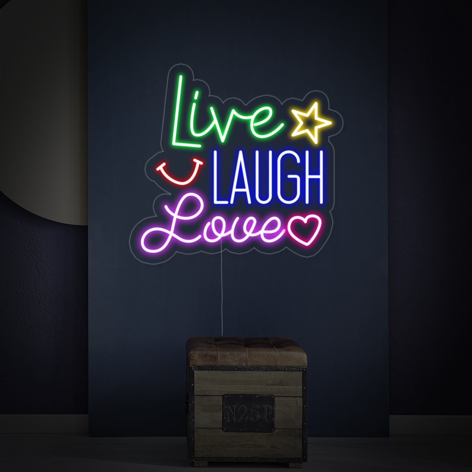 Closeup view of the 'Live Laugh Love' neon sign letters, showing the 3D quality and clear acrylic backing.