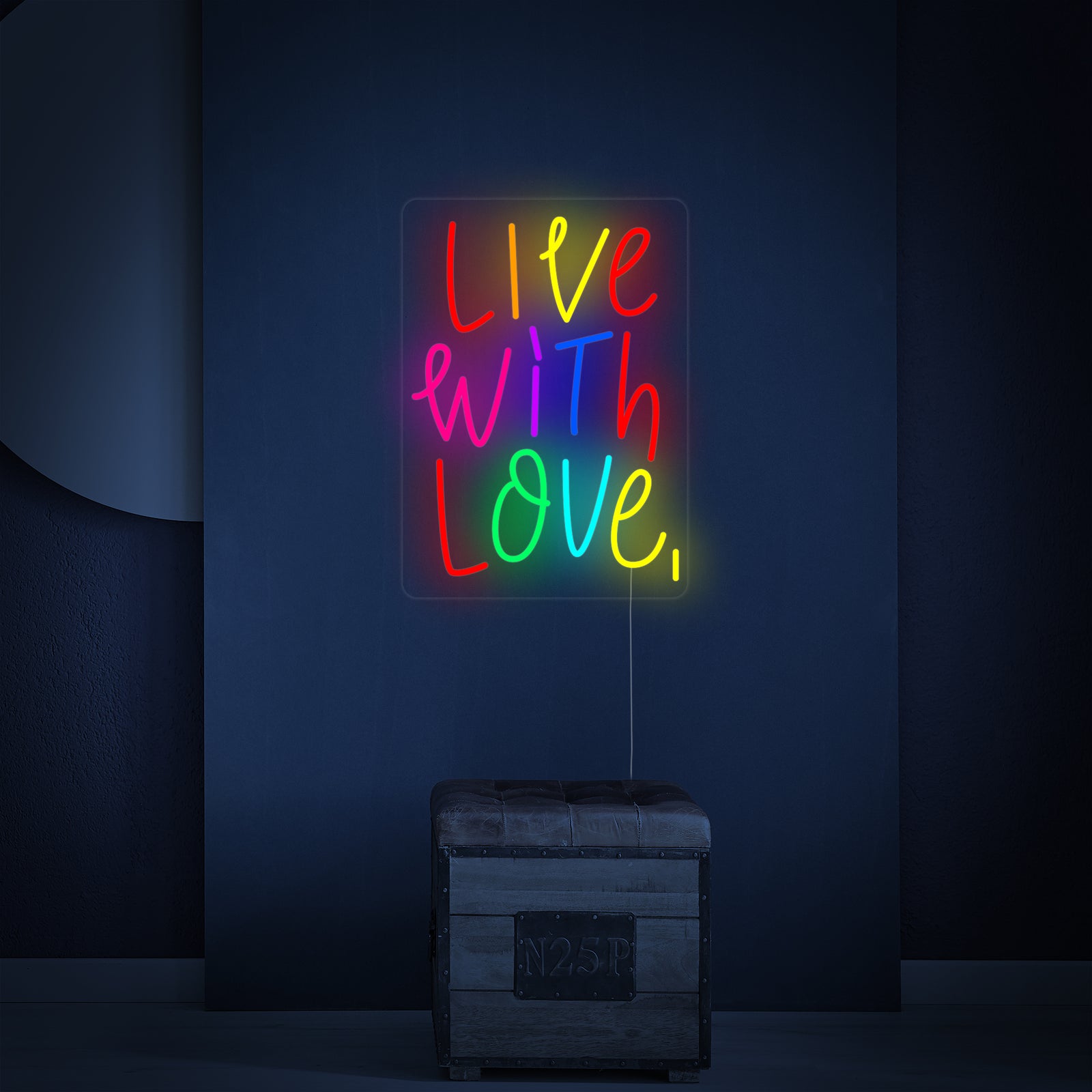 A lifestyle shot of the 'Live With Love' neon wall decor glowing brightly in a modern living room setting.