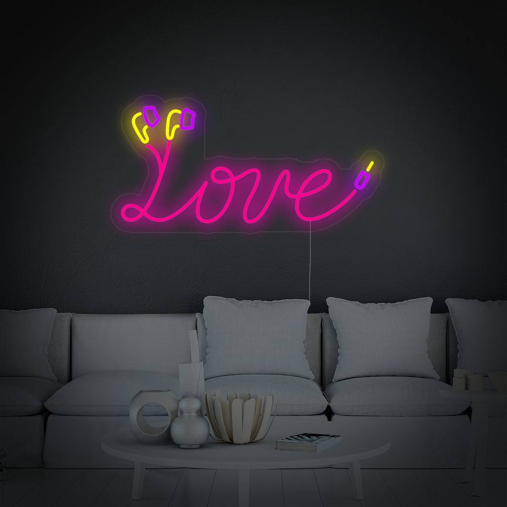 The 'Love Earphones Cable' neon sign design featuring a heart and headphone cord motif.