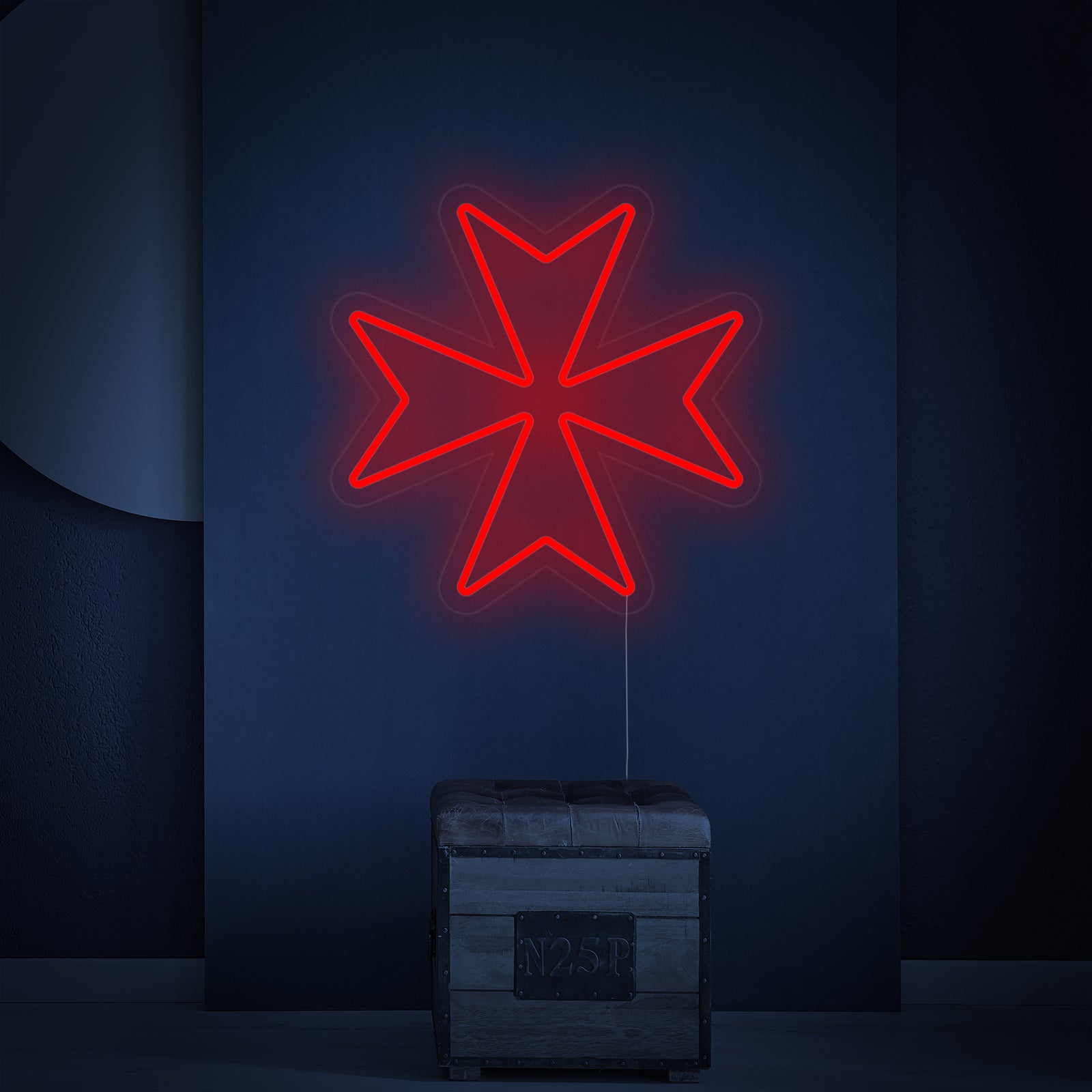 A detailed view of the illuminated Maltese Cross neon sign, showcasing its glowing white contours on a clear acrylic backing, set against a dark, industrial backdrop.