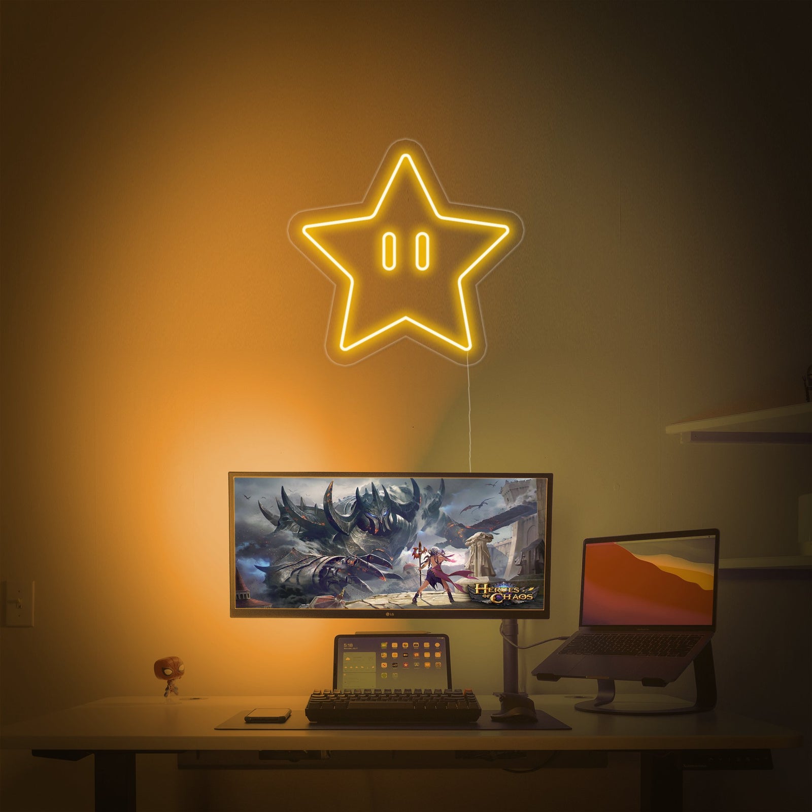 Vibrant yellow Star Power neon sign glowing above a gaming setup with a curved monitor.