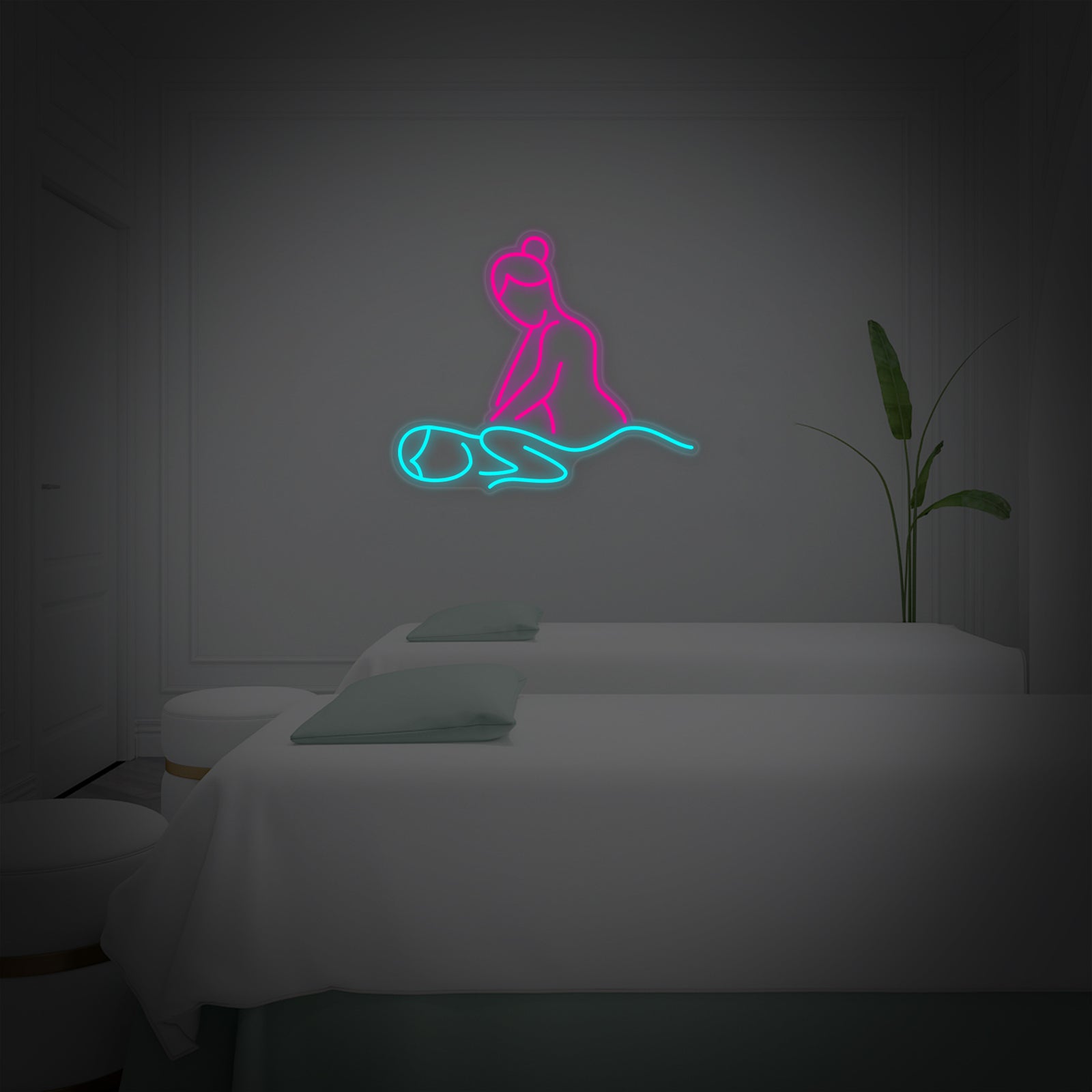 "Massage Skin Care" neon sign glowing warmly against a modern wall in a dim setting.