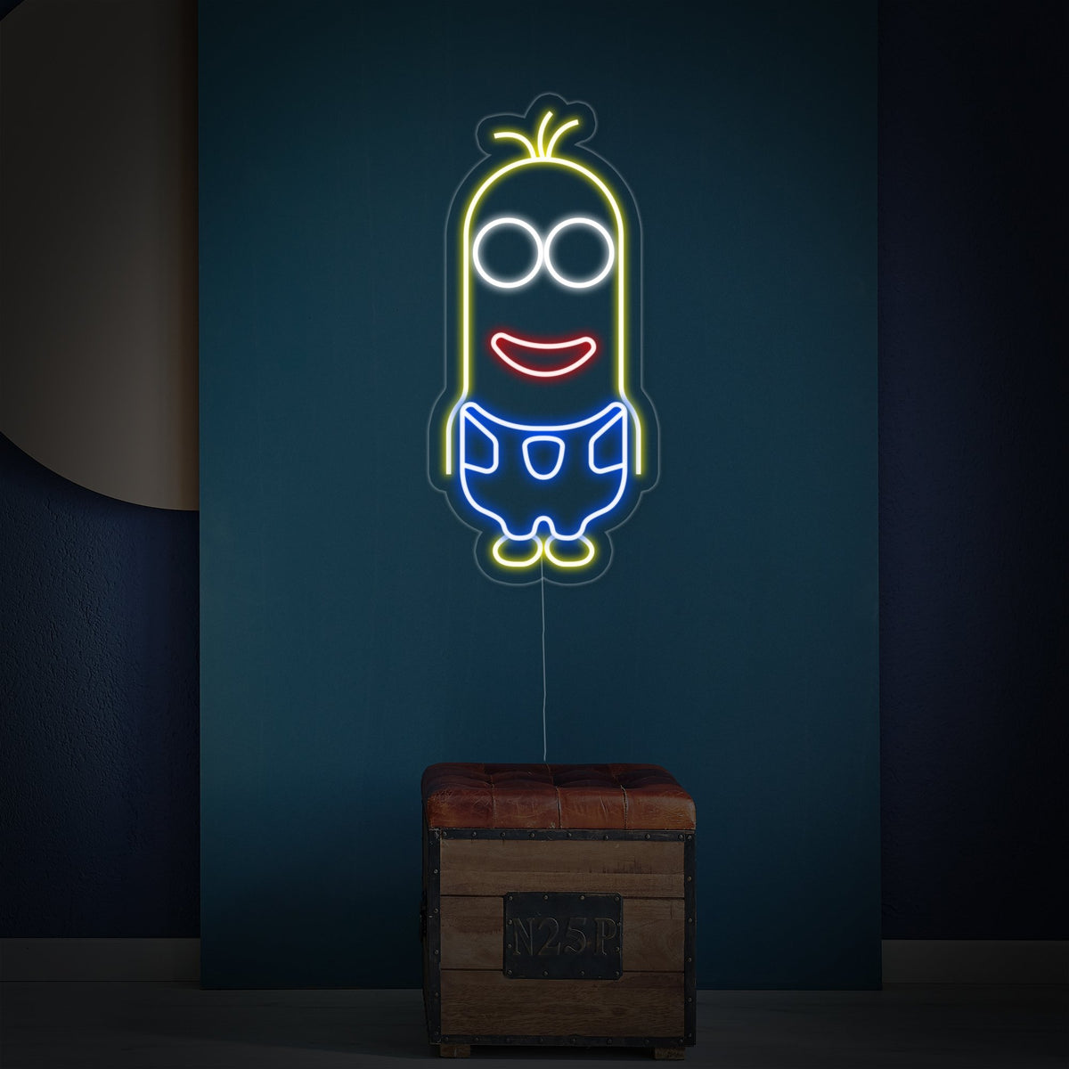 Detailed close-up showing the intricate design of the Minion neon sign.