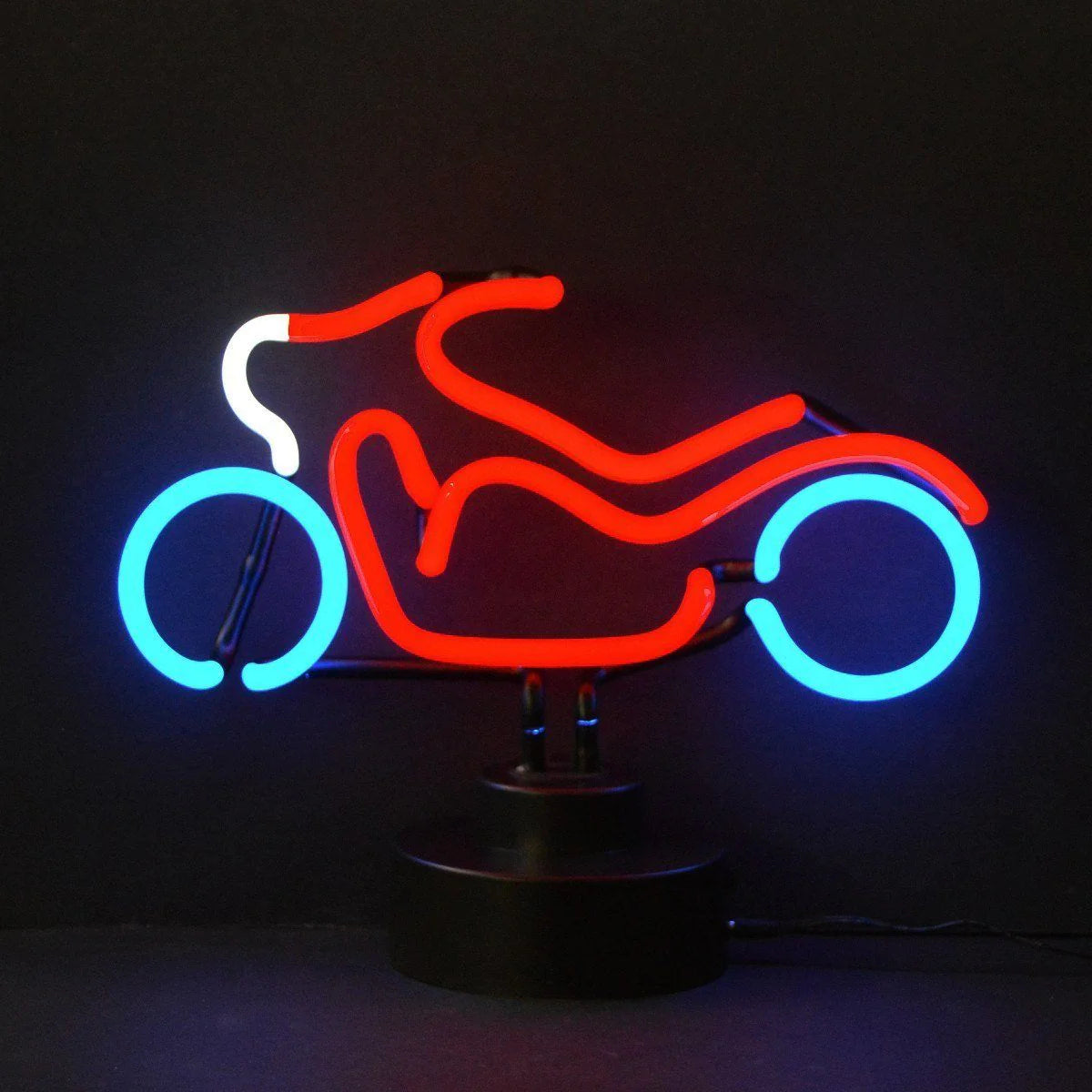 A glass tube neon sign depicting a motorcycle, mounted on a base as a table lamp, illuminated against a black background.