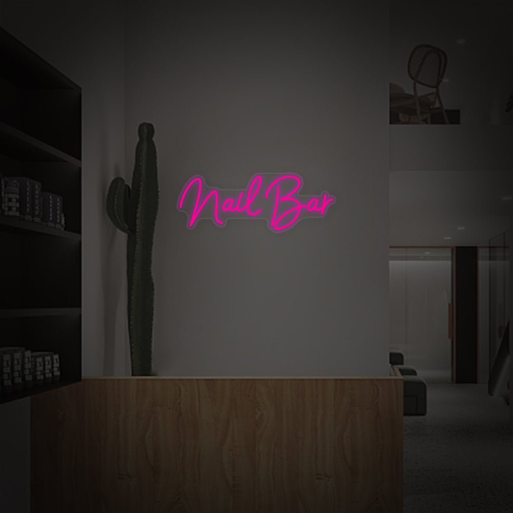 Detailed product shot of the 'Nail Bar' neon sign design showcasing the sleek tubing and clear mounting backing.