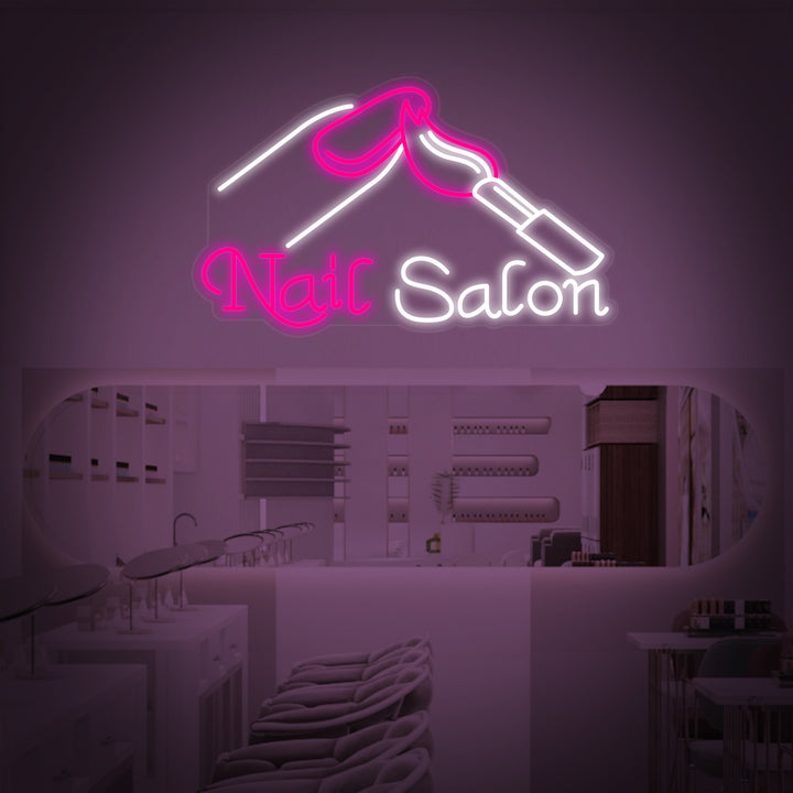 A close-up view of the detailed and vibrant 'Nails' neon sign, showcasing its design and lighting quality.