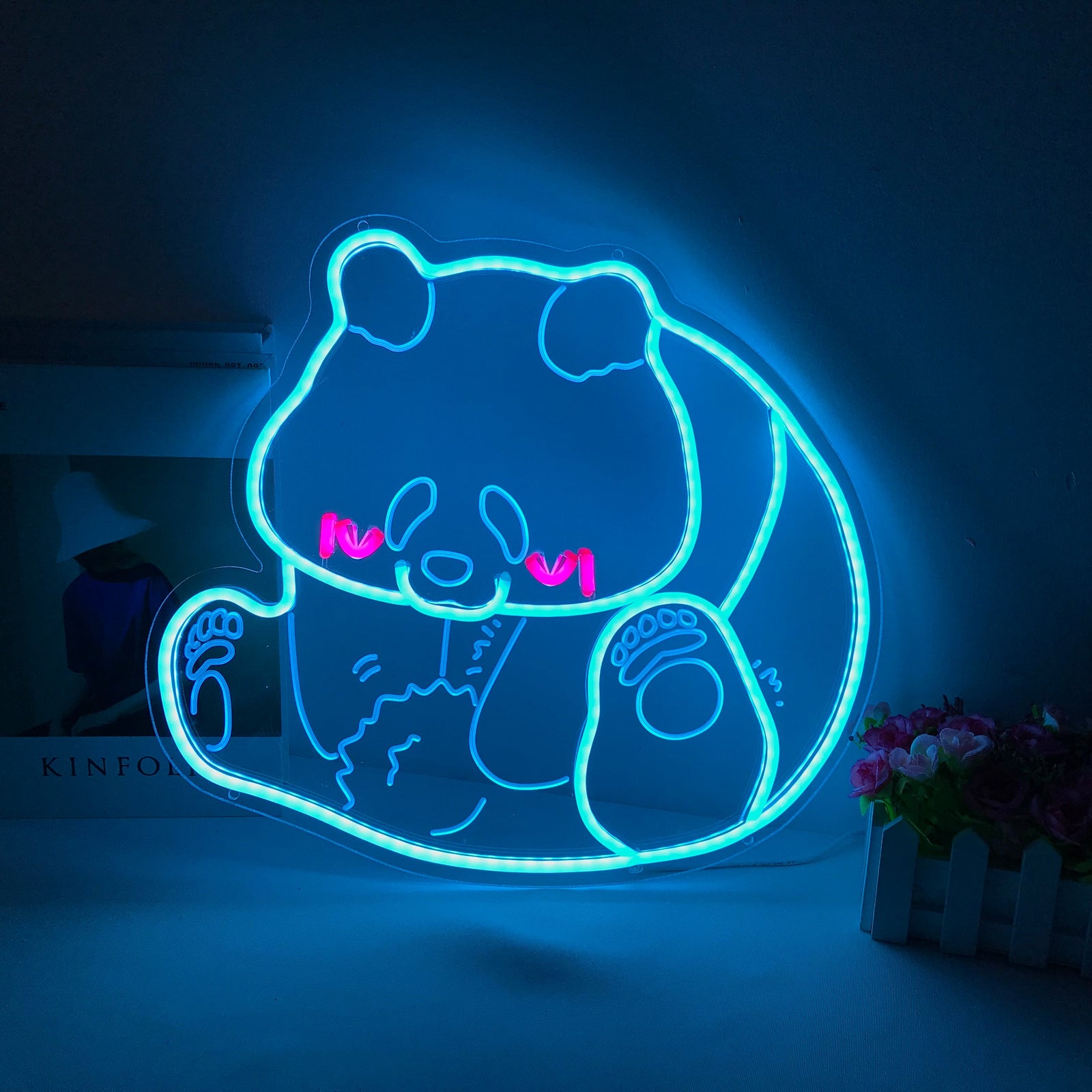 A "Panda, Cartoon" mini neon sign glowing on an acrylic backing against a dark background.