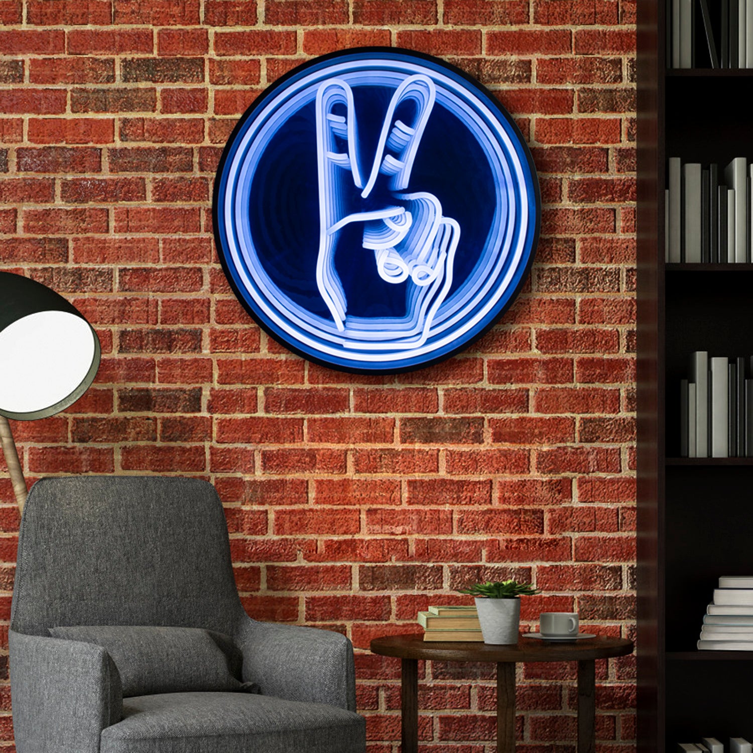Illuminated view showing the multiple concentric rings of glowing red light receding into a depth effect within the circular peace symbol design.