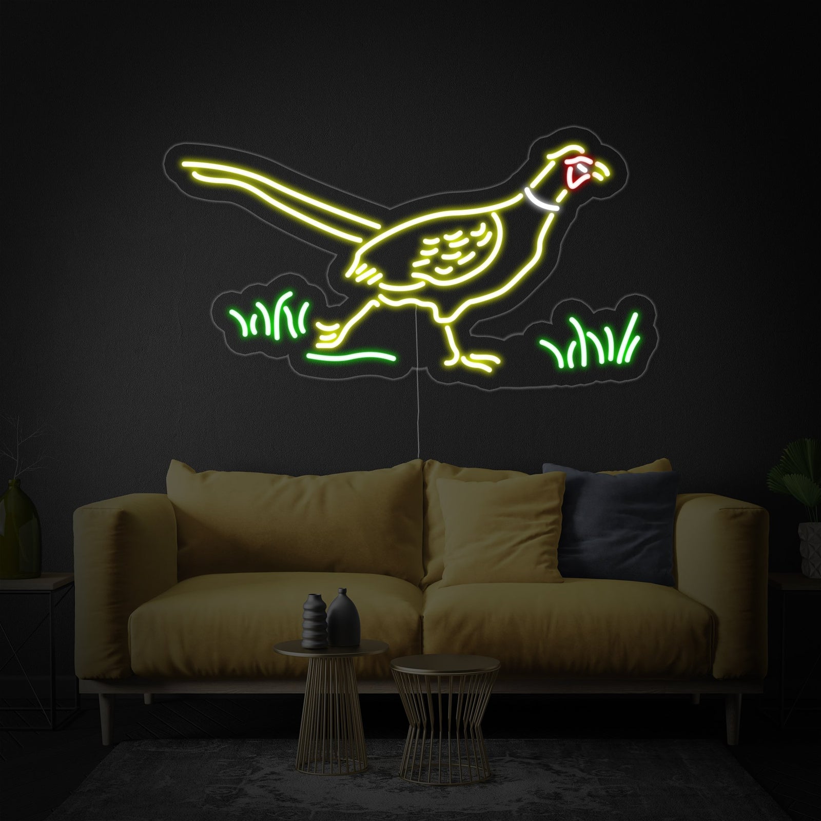 A glowing green neon sign shaped like a pheasant mounted on a light-colored wood panel wall.