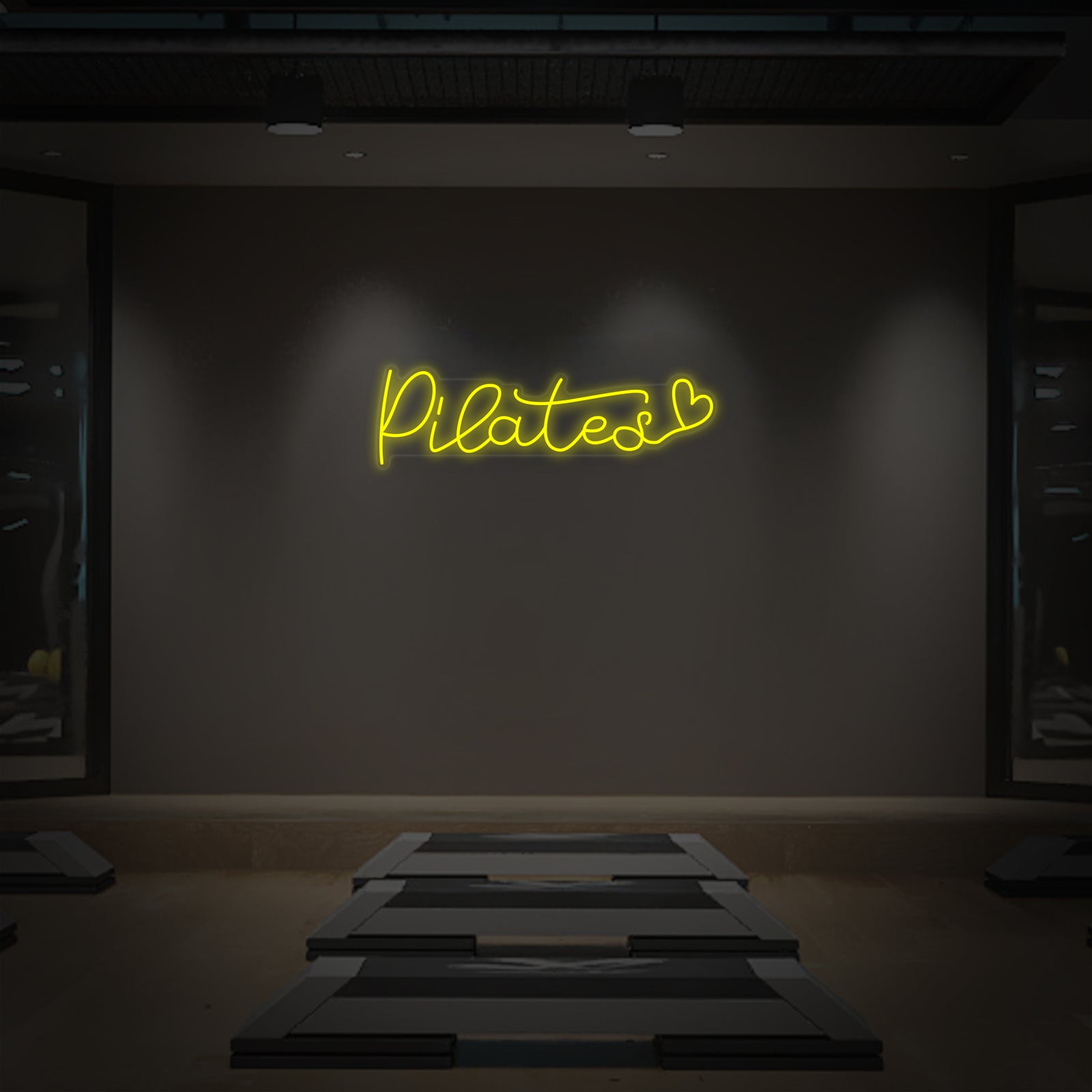 A flat-lay illustration or graphic mockup of the "Pilates Heart" neon sign on a simple textured wall background.