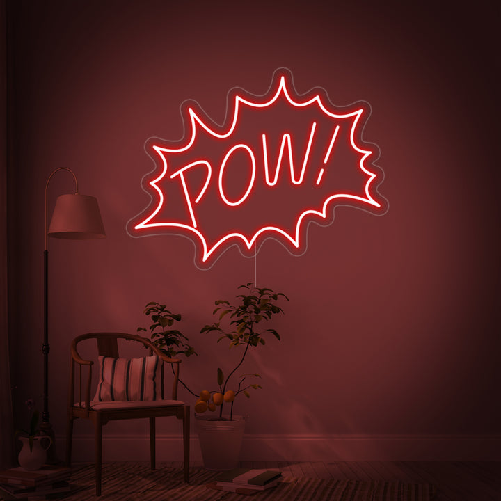 Close-up mockup of the 'Pow' neon sign design with realistic tubing on a clear acrylic backing, set against a blurred interior wall.