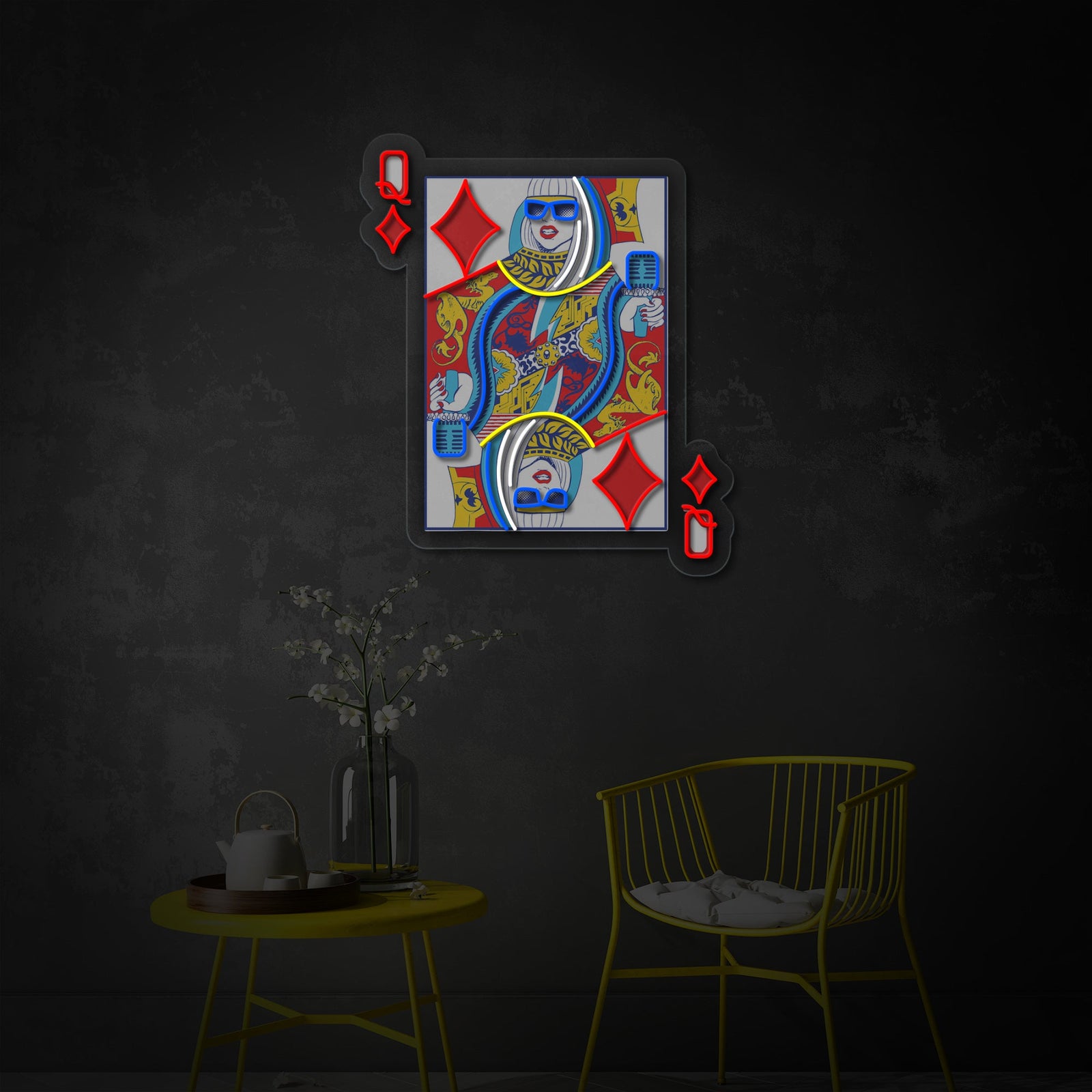 A vibrant 'Q Of Glam, Pop Star Idol' UV print neon sign displayed on a clean wooden table in a brightly lit room.