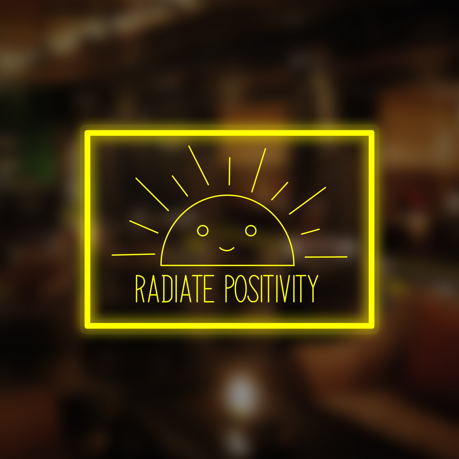 A glowing 'Radiate Positivity' mini neon sign in white light, featuring cursive text.