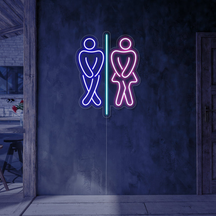 A vibrant Restroom Boy and Girl Toilet neon sign design graphic over a blurred, modern restaurant restroom entrance.