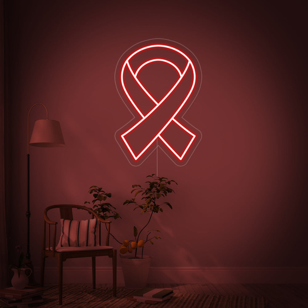 Ribbon neon sign glowing on a clean light colored wall.