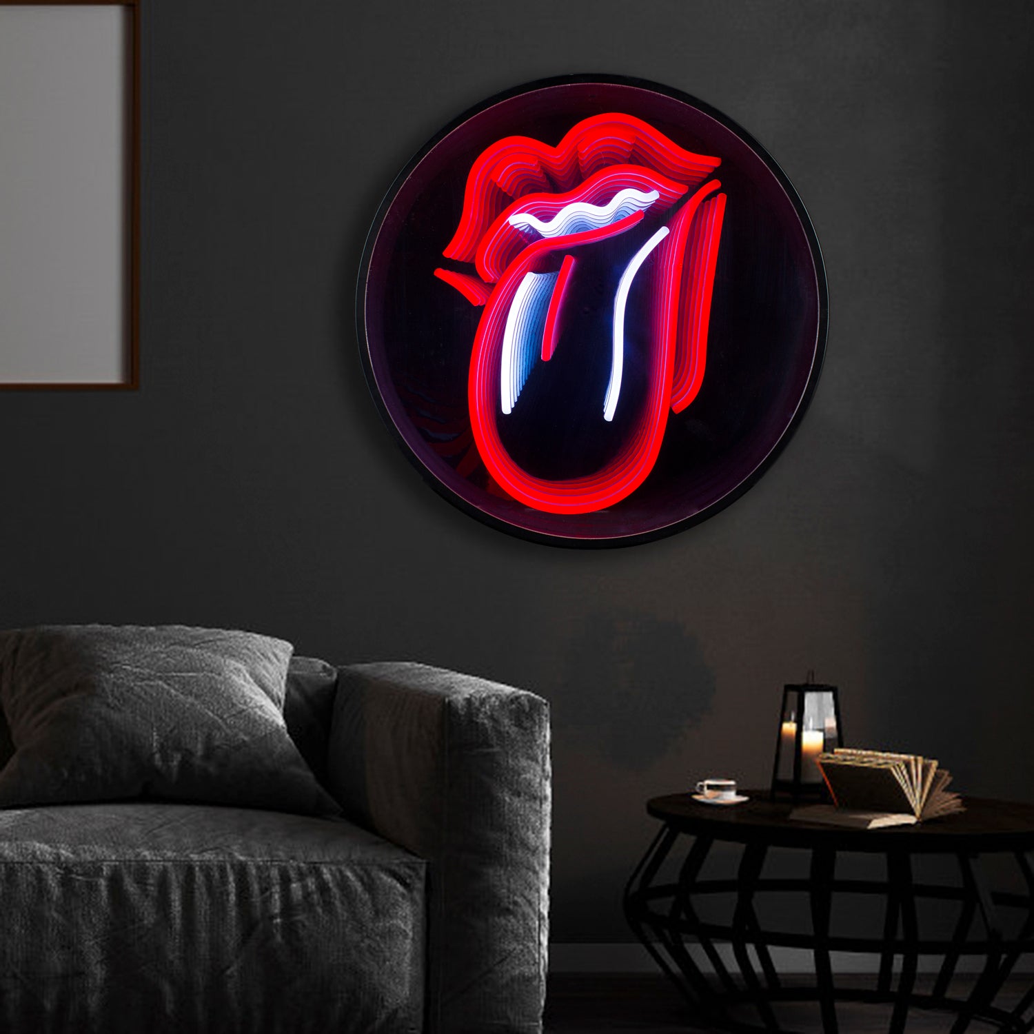 A circular Rolling Stones neon sign glowing brightly on a wall in a dimly lit room.