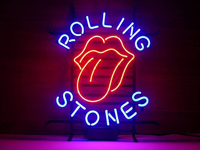 A vibrant red and white Rolling Stones Hot Lips logo neon sign illuminated against a wooden wall background.