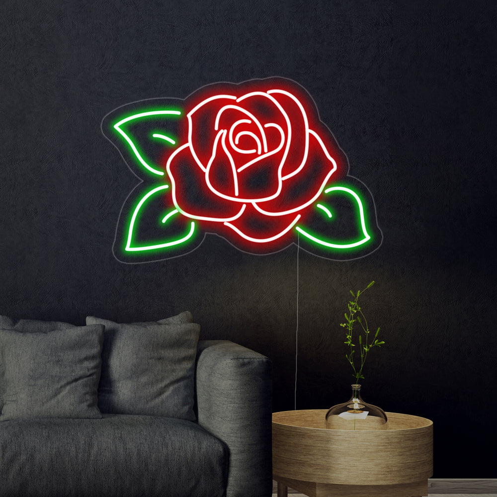 A detailed view of the pink rose flower neon sign with its protective backer visible.