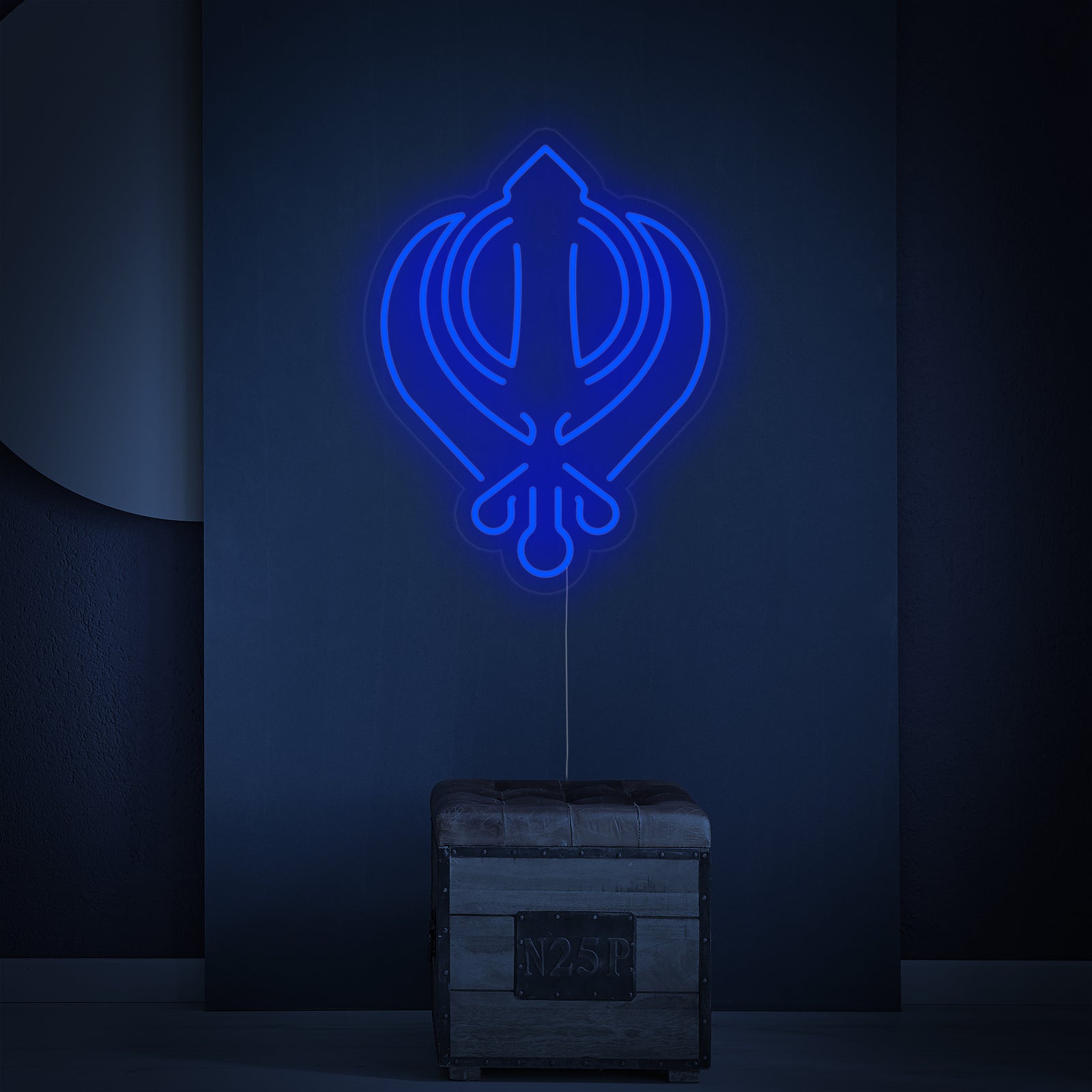 Close-up photograph of an unlit 'Sikhism Khanda Symbol' neon sign showing the physical tubing and mounting structure.
